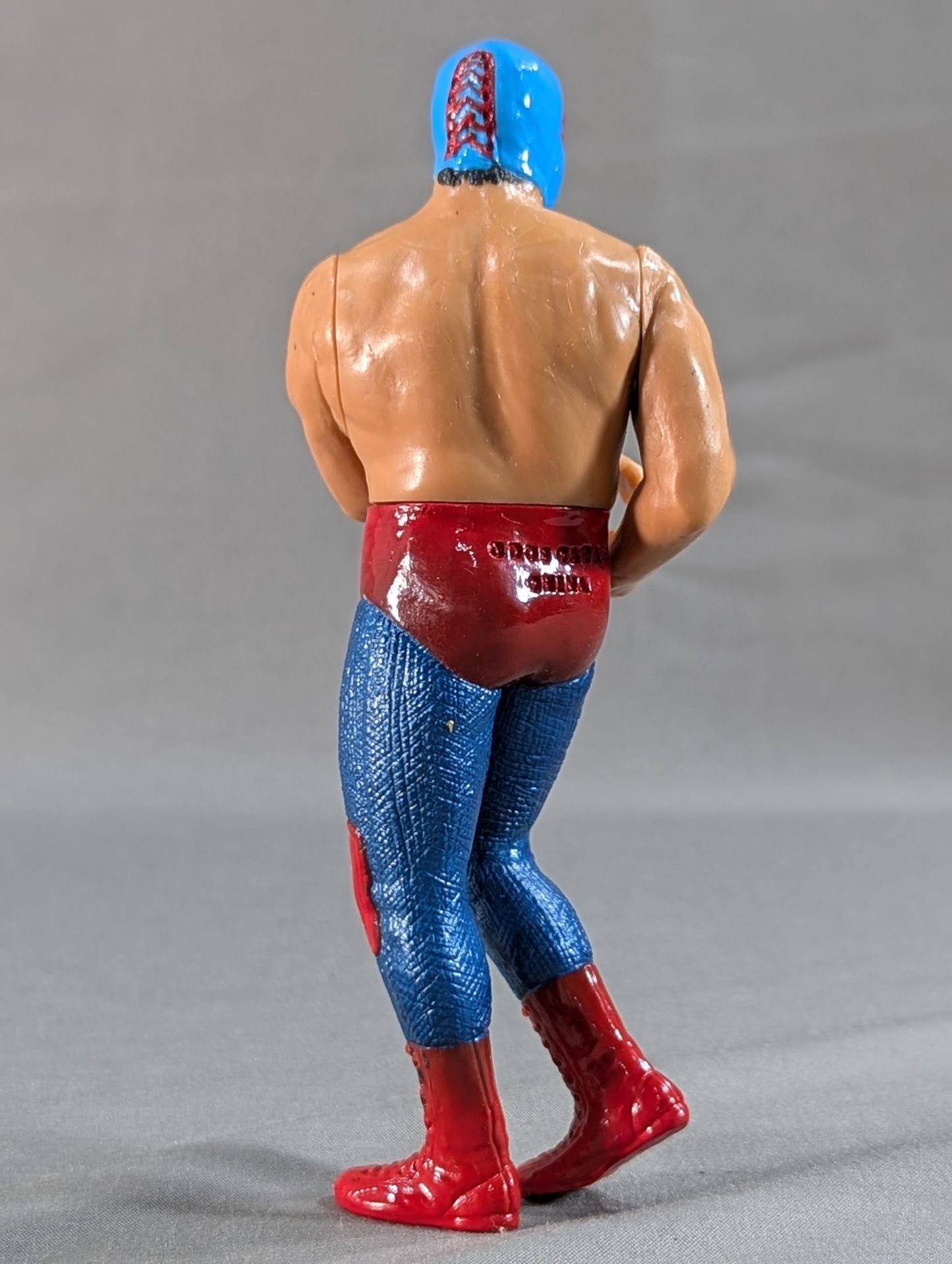 Dos Caras (light blue mask)