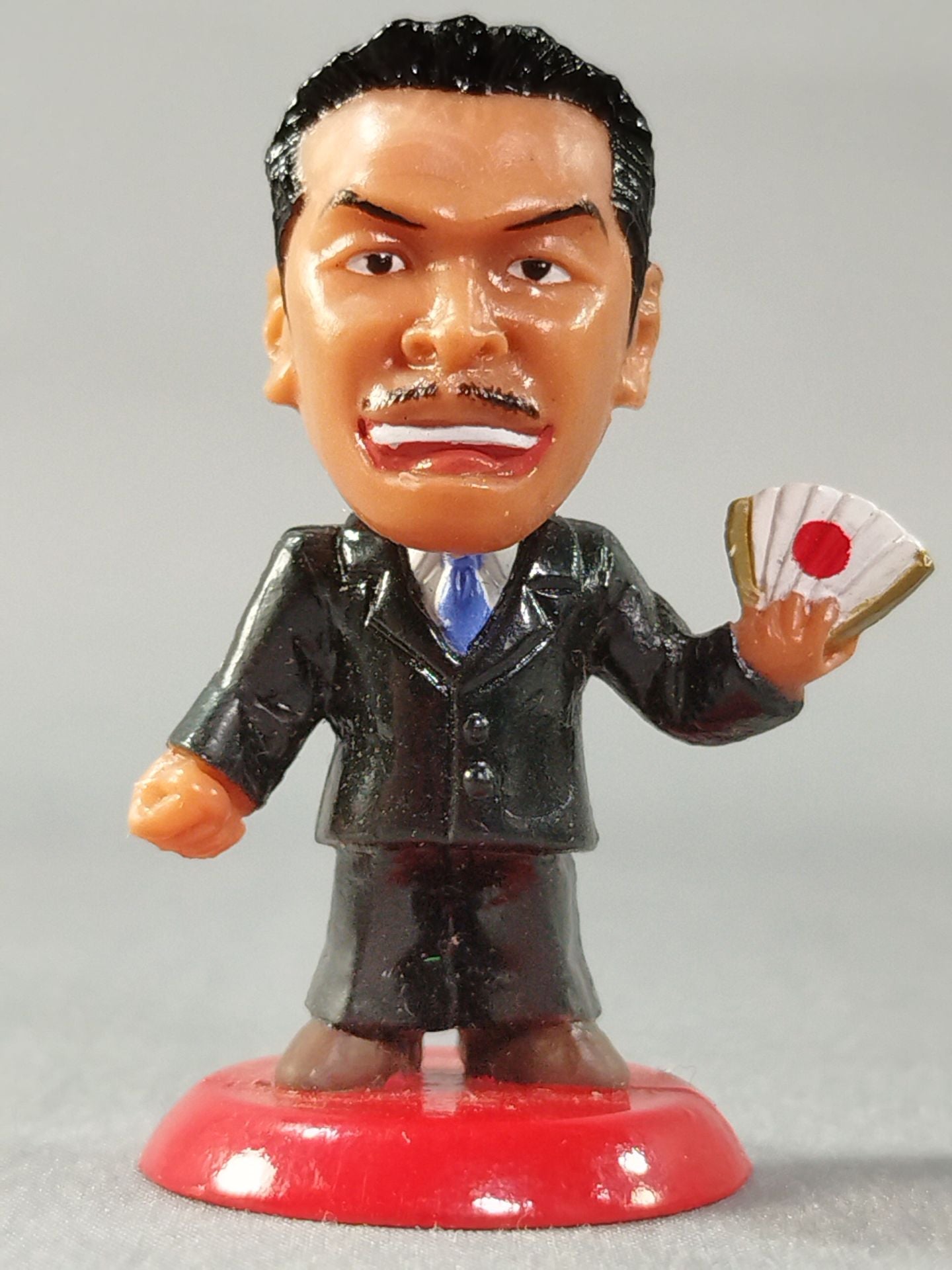 Hiroshi Hase (B) Black Suit