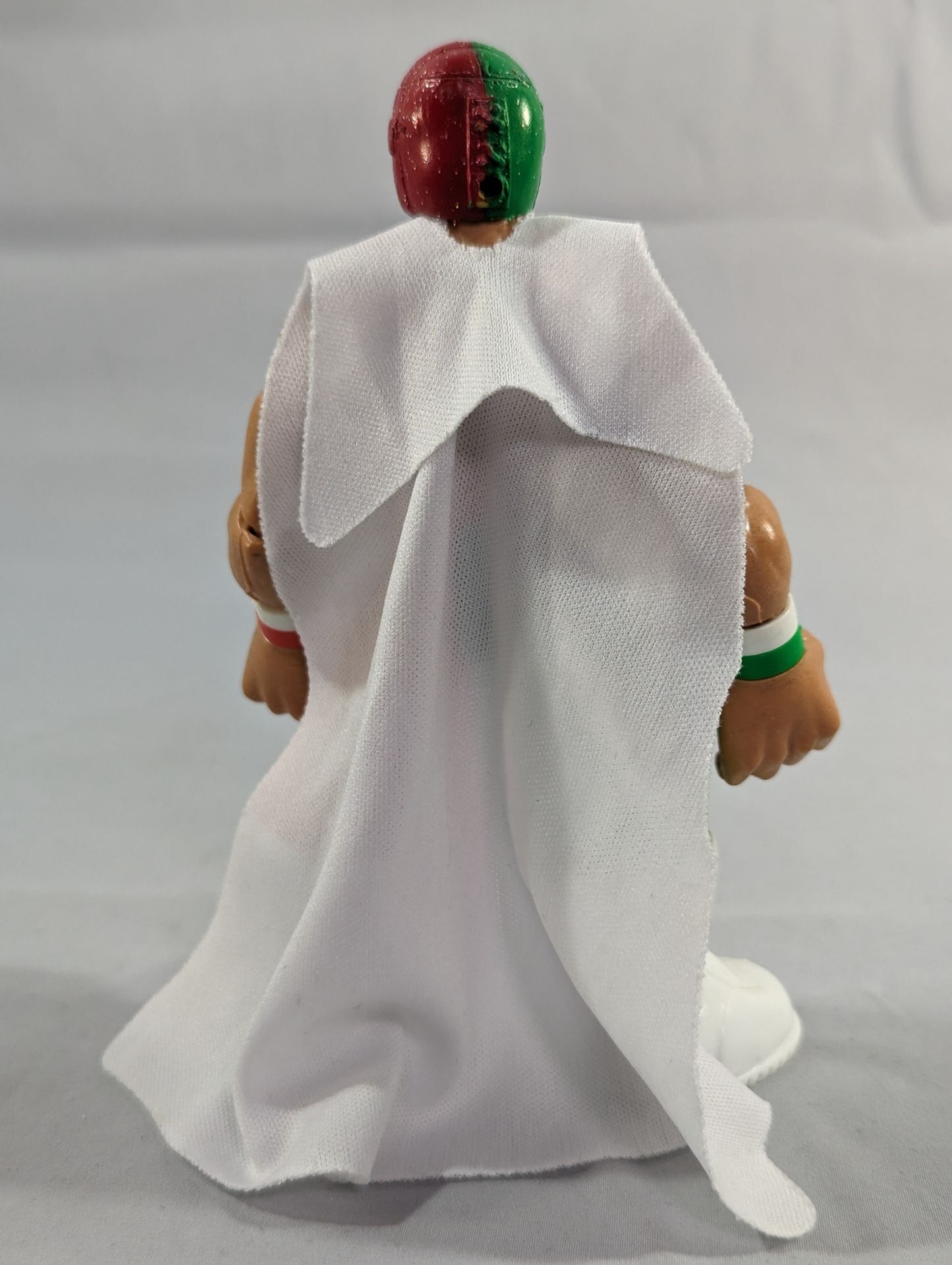 BUSHI  (Mexican figure, green× red)