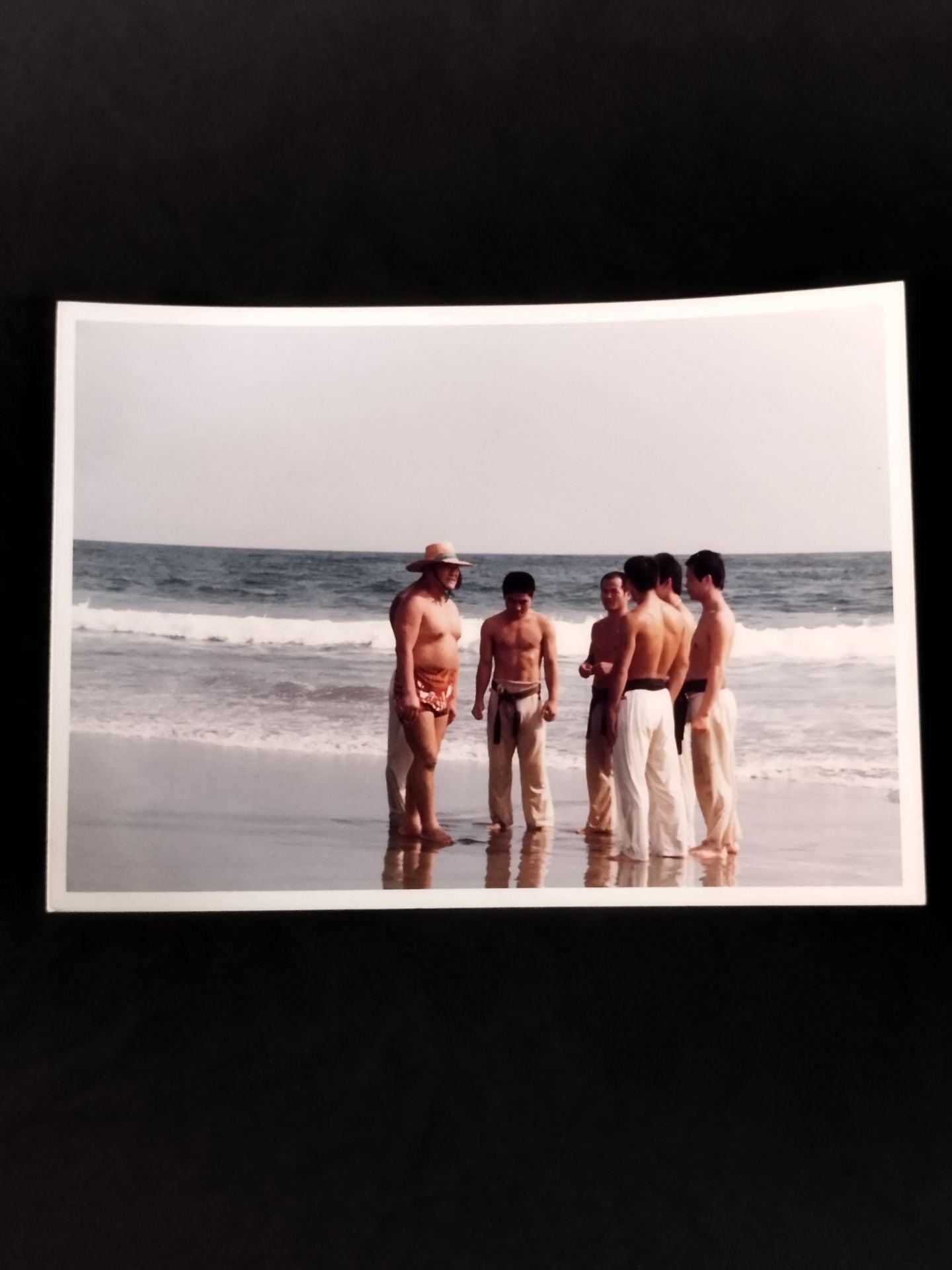 Mas Oyama (Masutatsu Oyama)  with his disciples on the beach photo