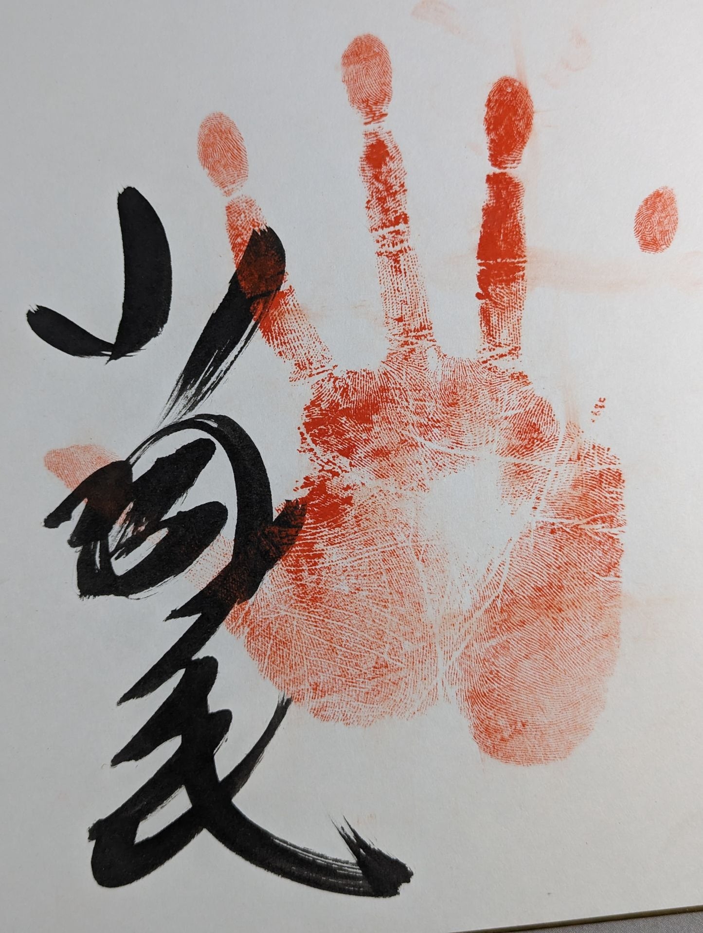 With handprint