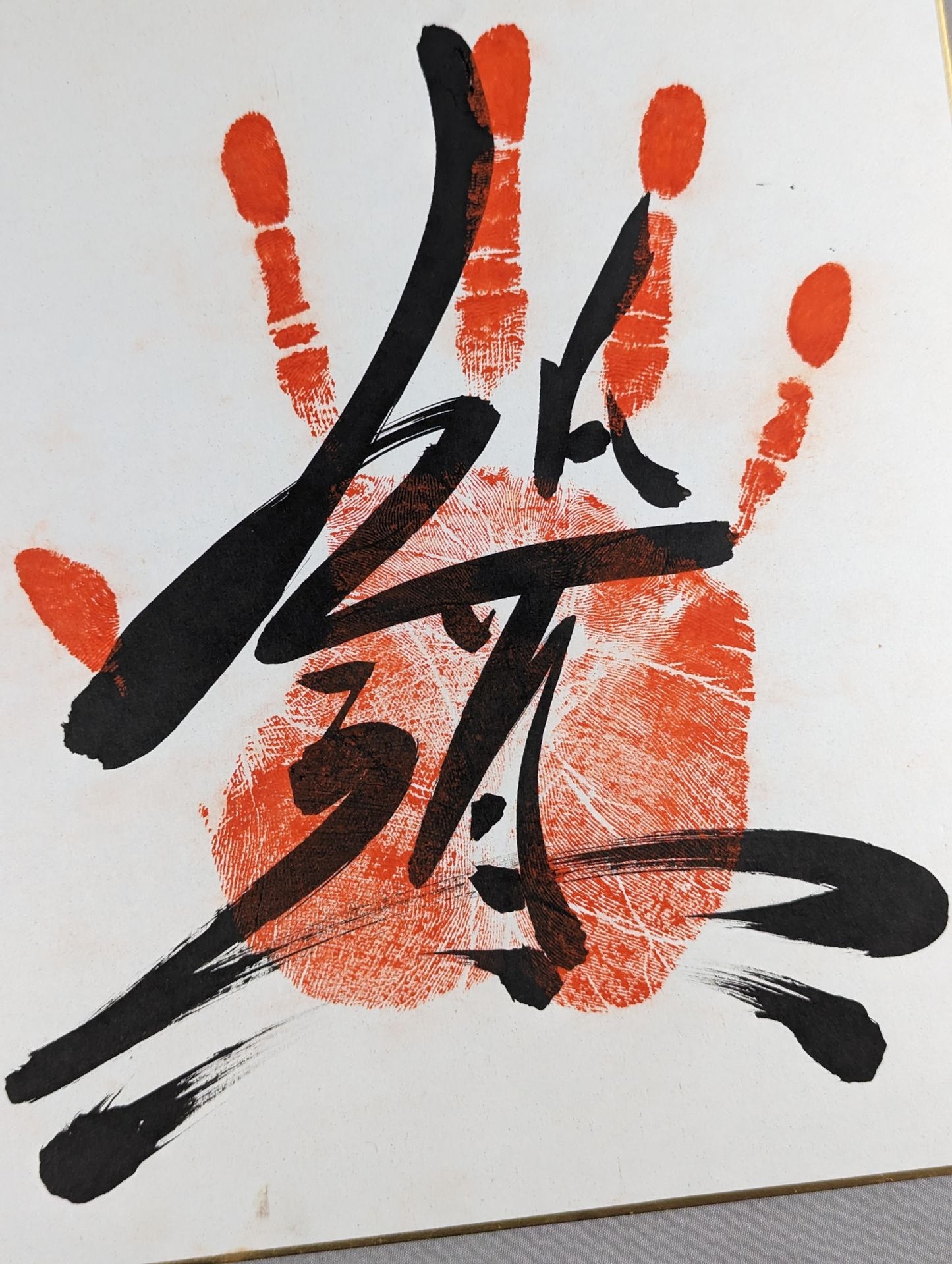 With handprint