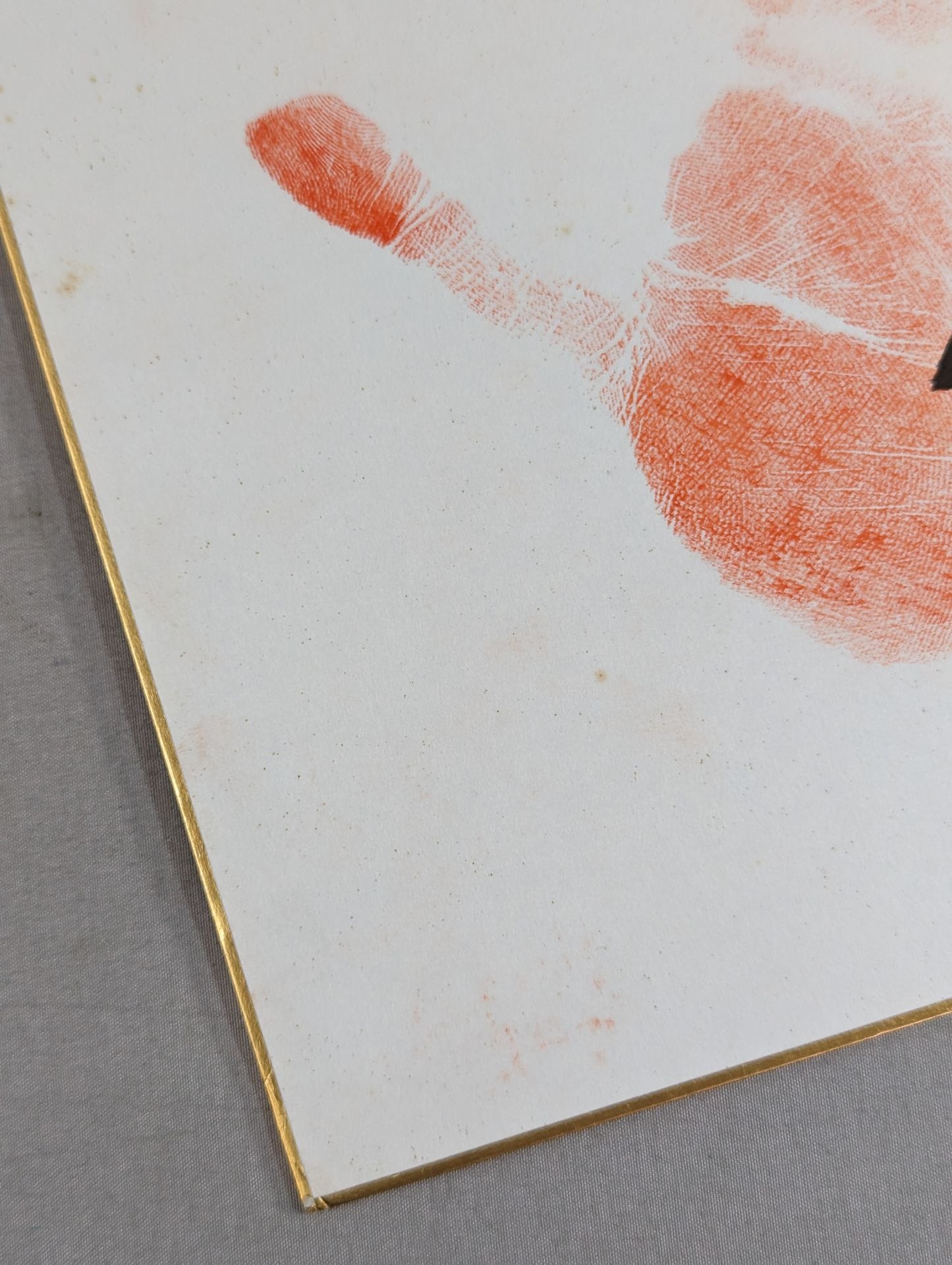 With handprint