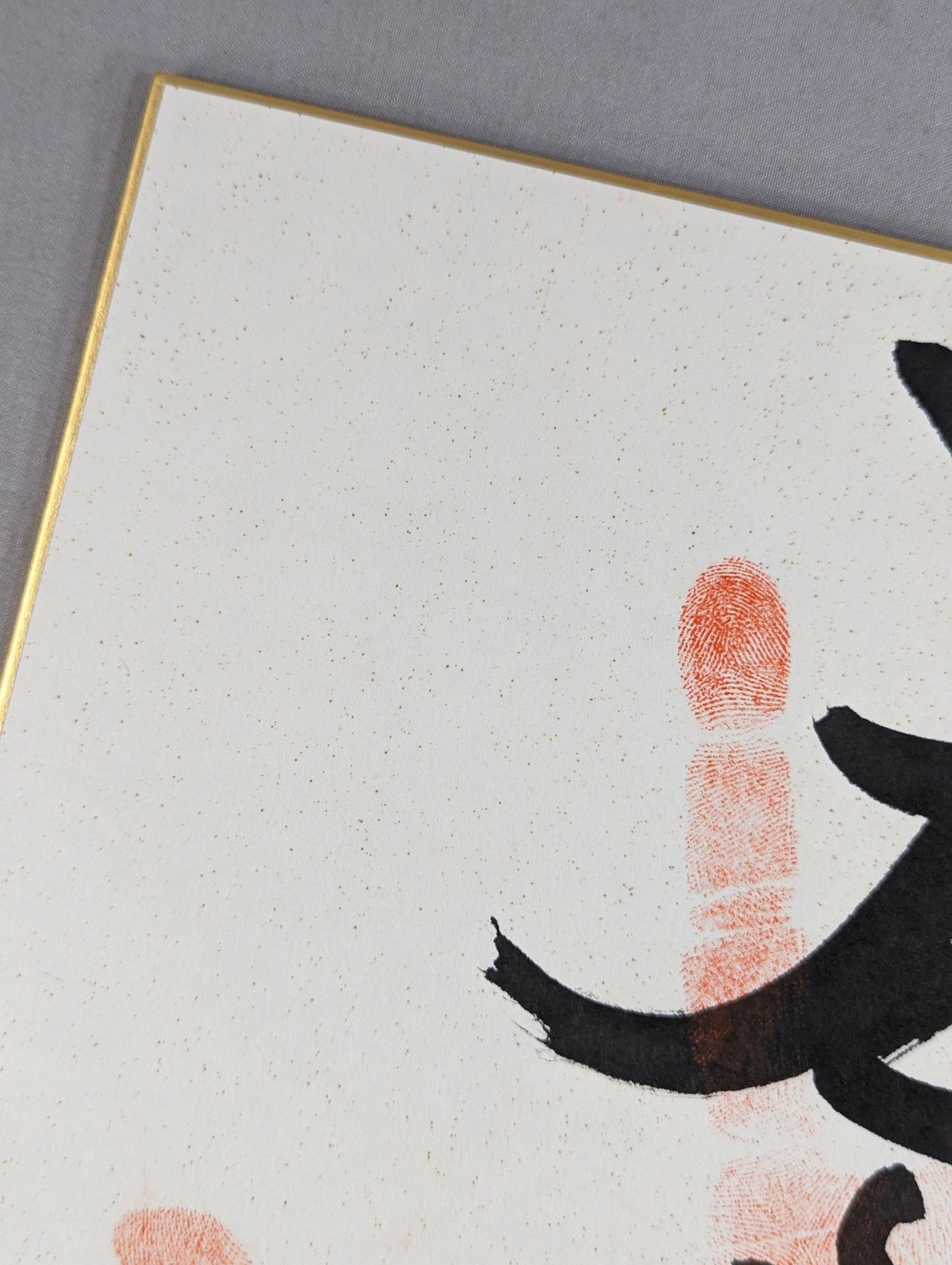 With handprint