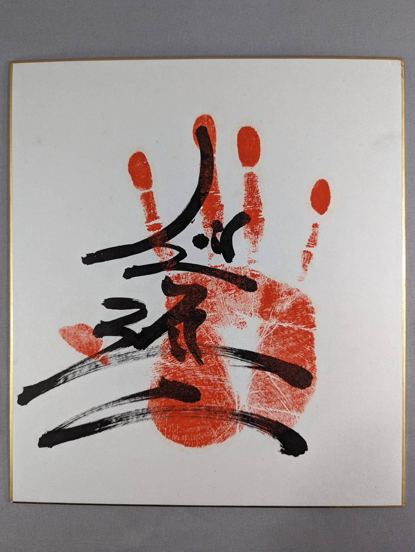 With handprint