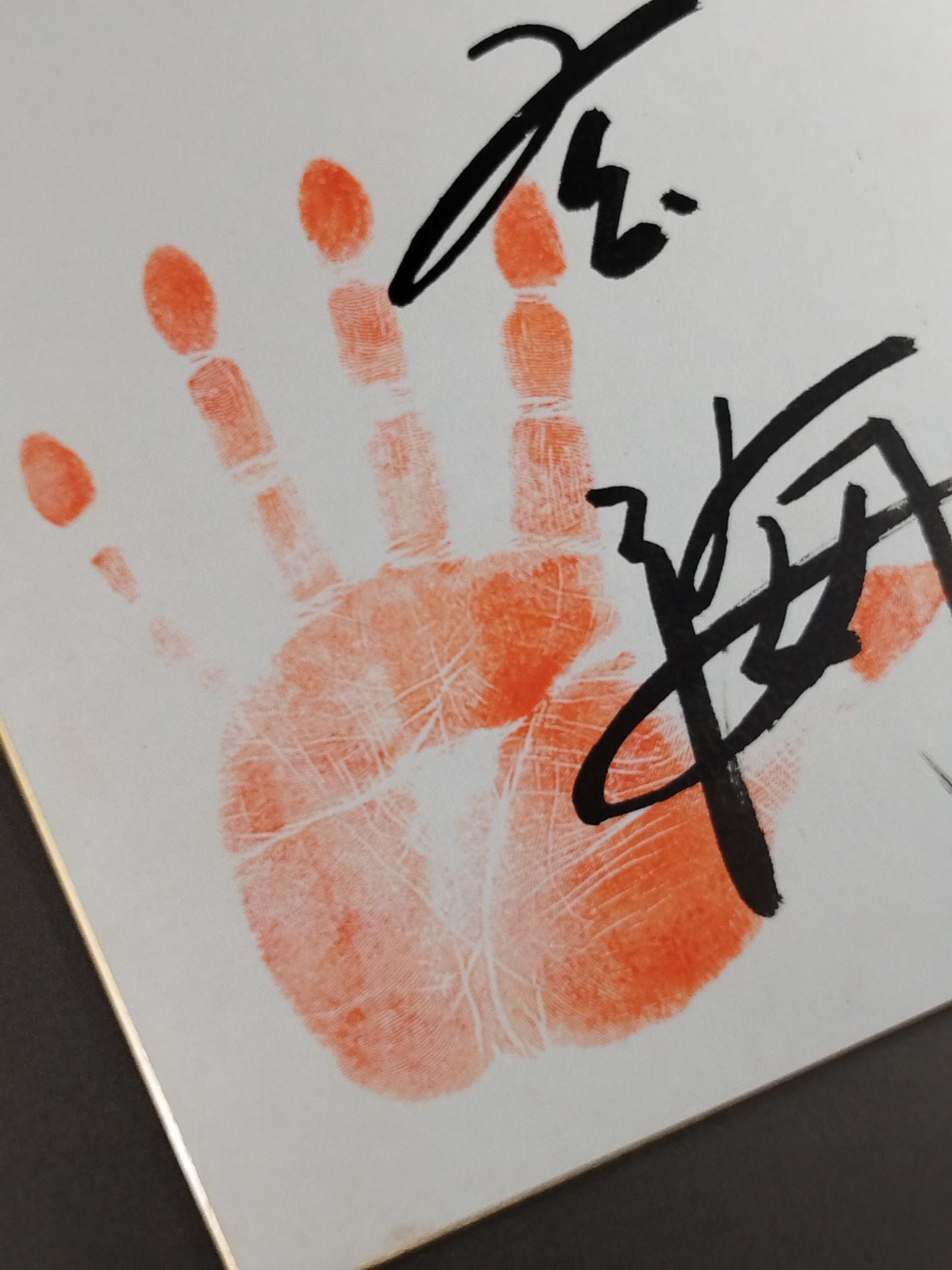 With handprint