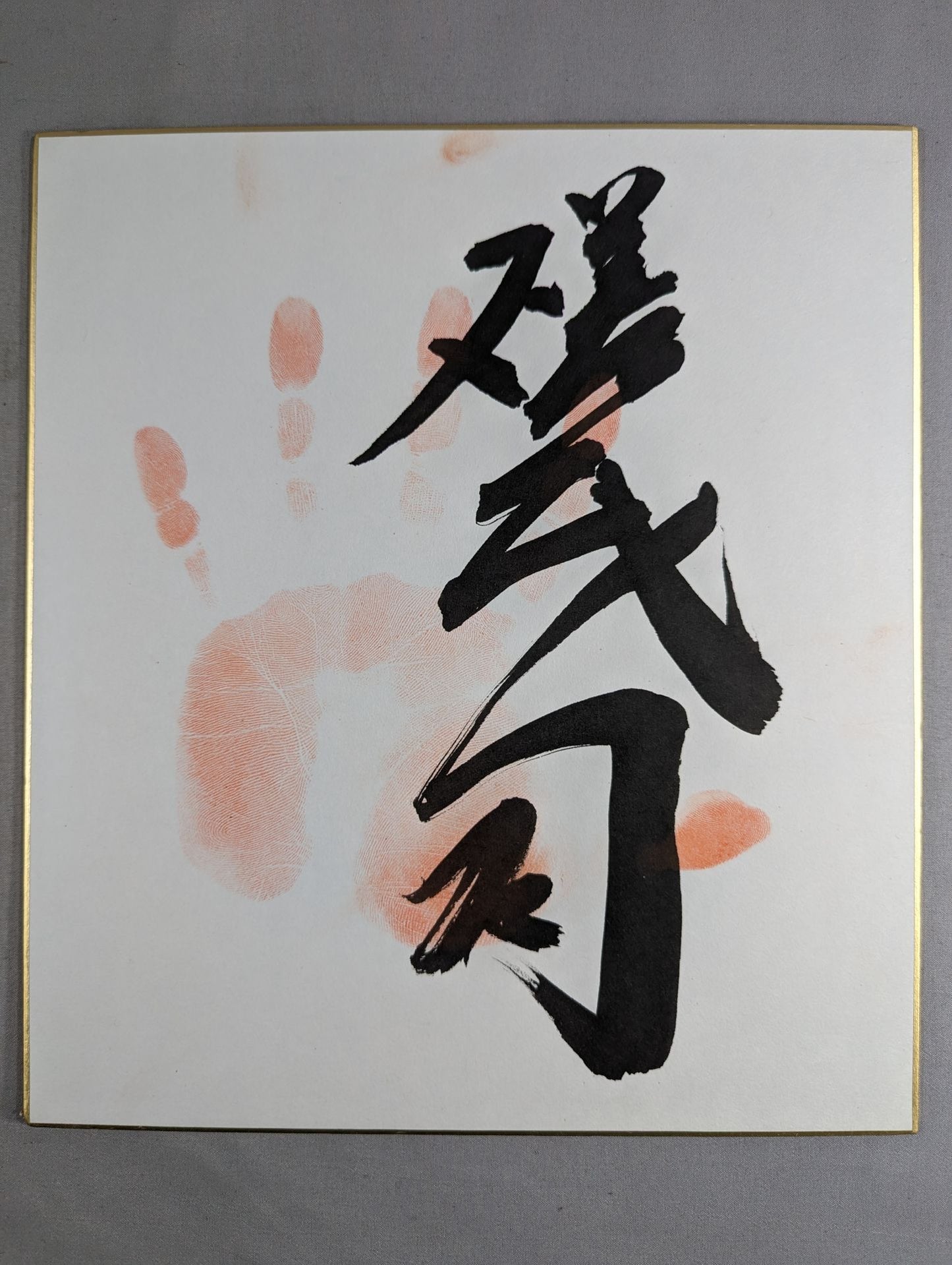 WITH handprint