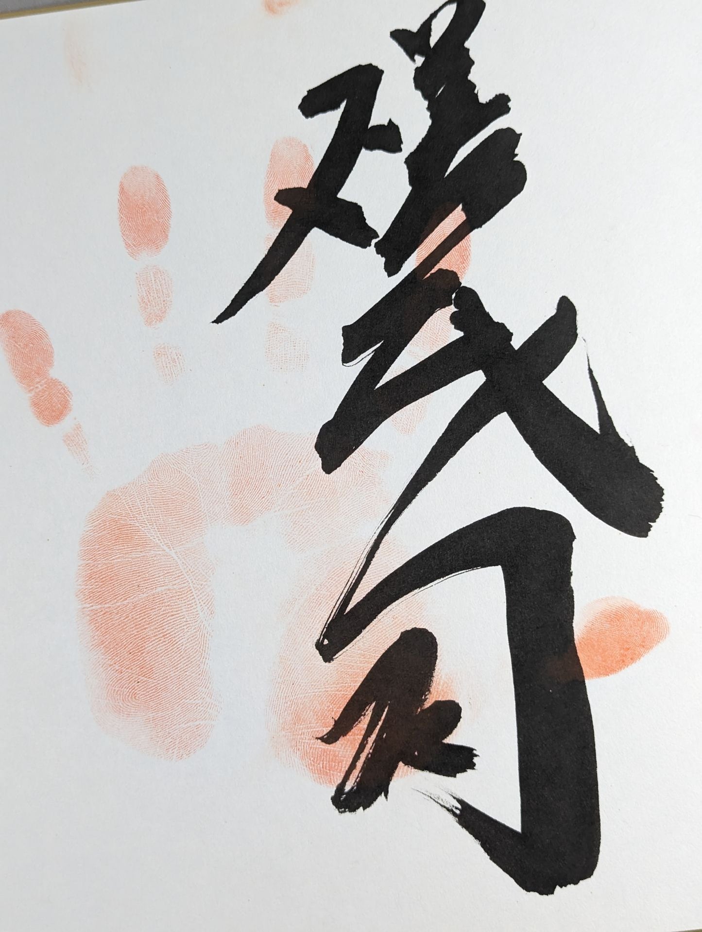 WITH handprint
