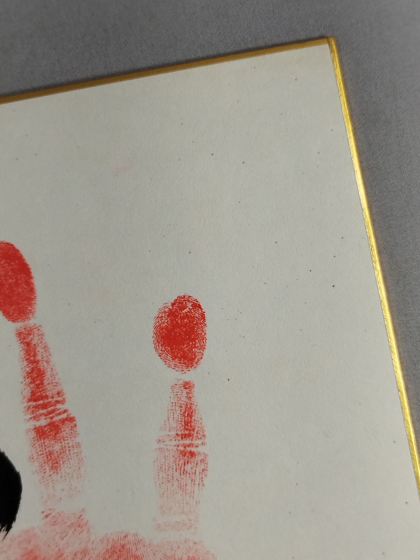 With handprint