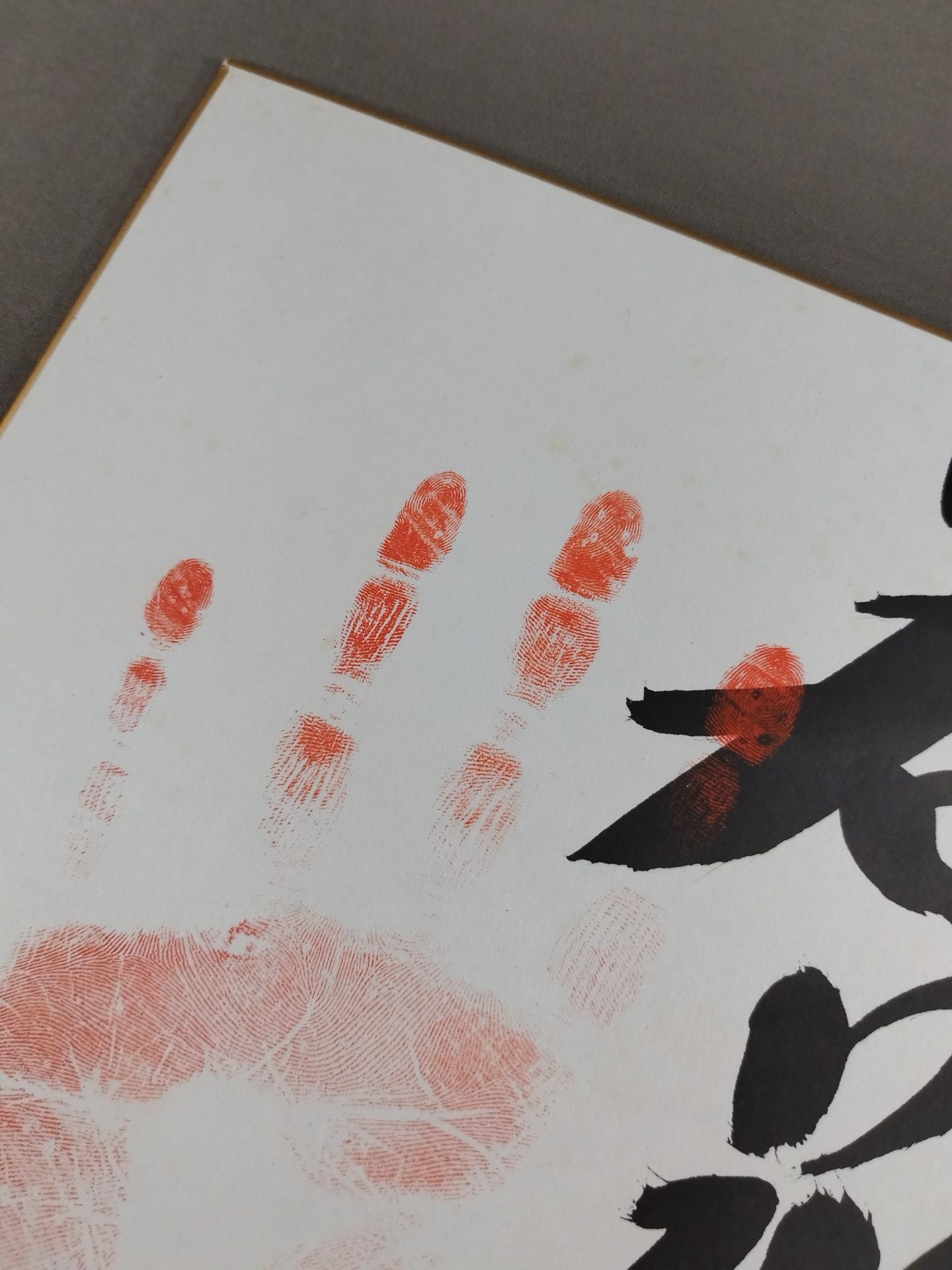 With handprint