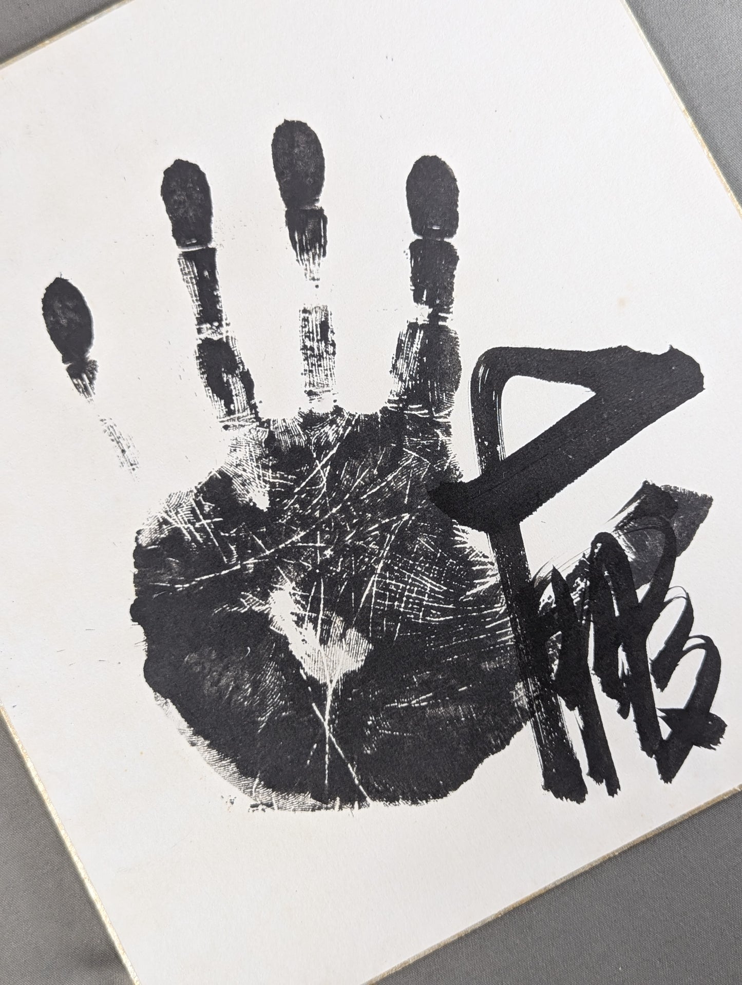 Taiho (black with handprint)