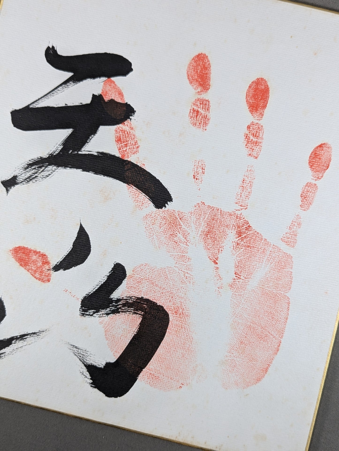 With handprint