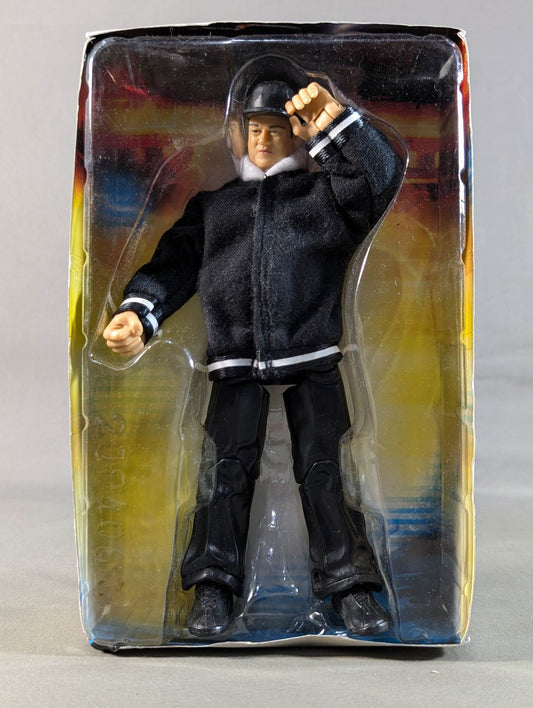 Paul Heyman (Black zip-up jacket )