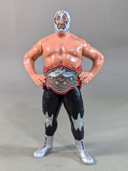 Mil Mascaras  (with silver trade and IWA belt)