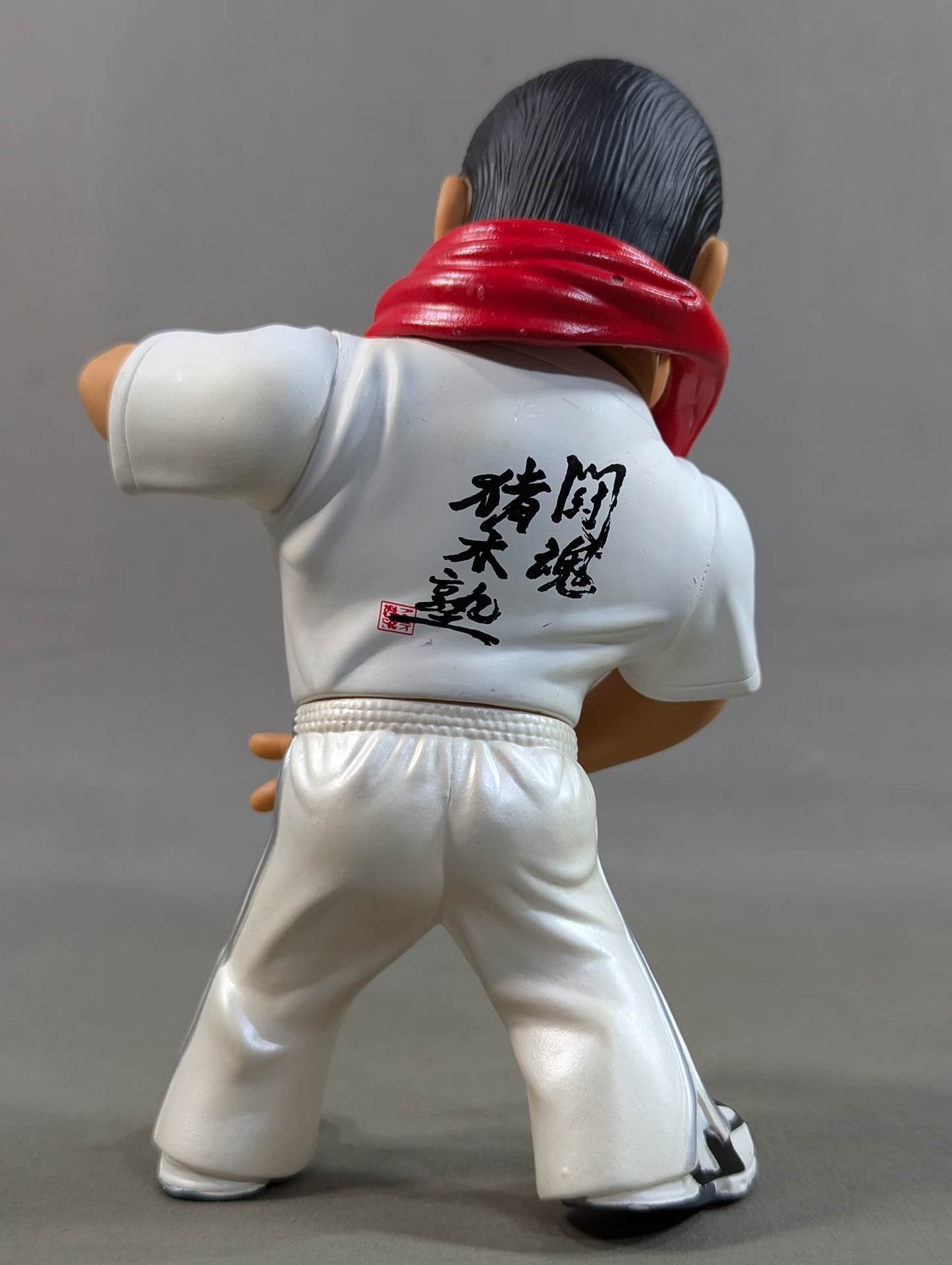 Antonio Inoki (red towel, white T-shirt)