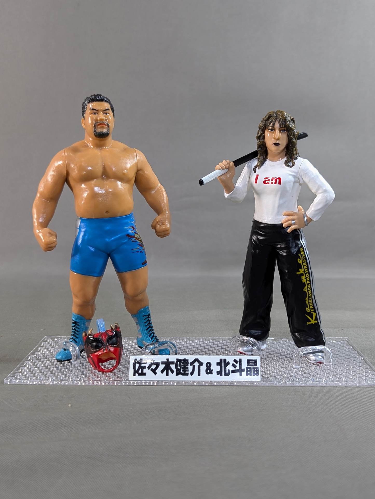 佐々木健介(水色)&北斗晶(白×黒)