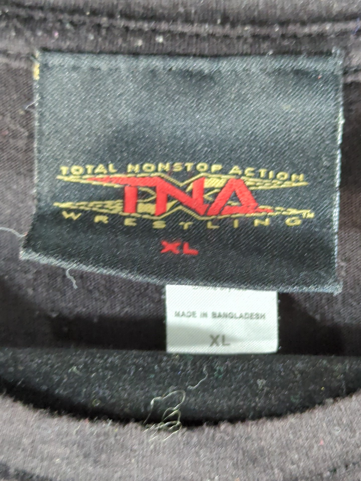 クリスティ・ヘミ「ROCKIN' THE WORLD」イラストTシャツ(ブラック)