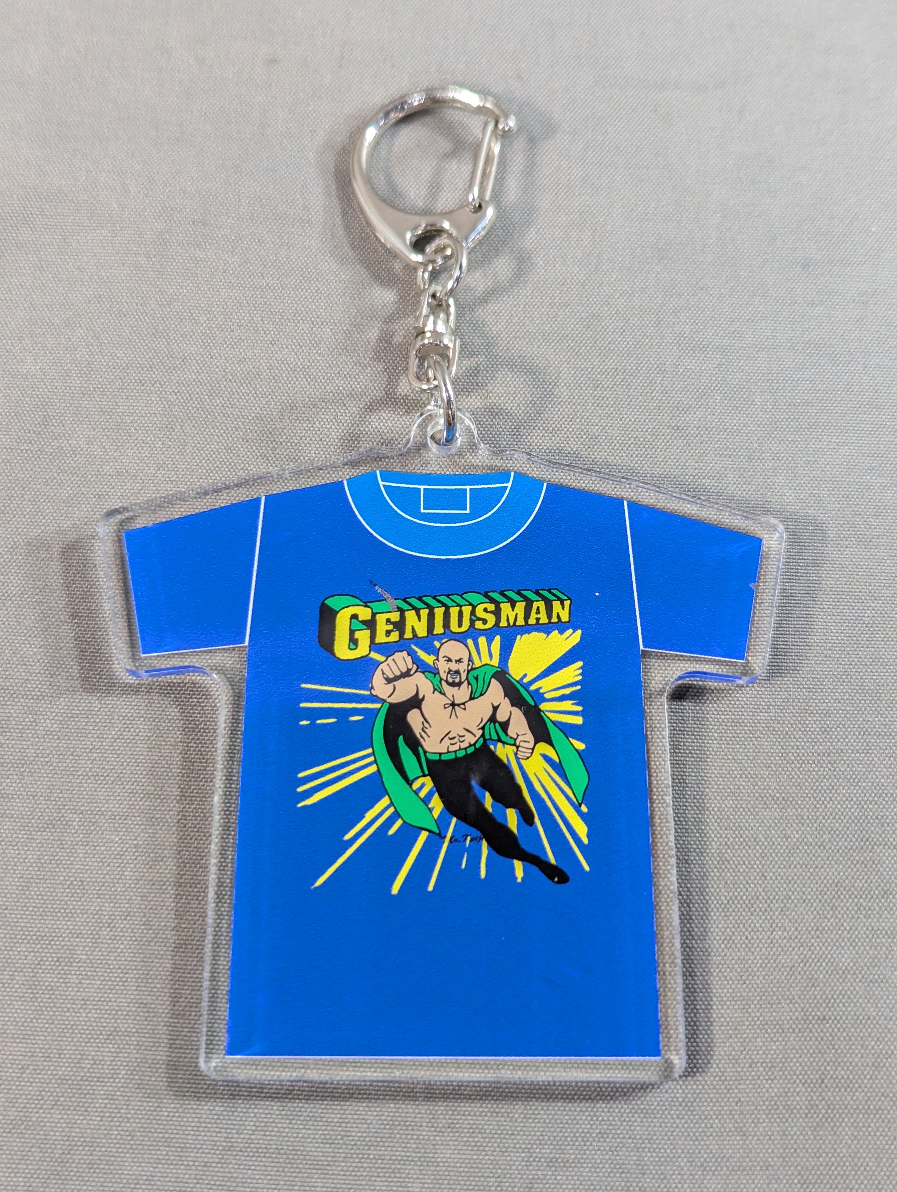 武藤敬司「GENIUSMAN」Tシャツ型アクリルキーホルダー – 闘道館