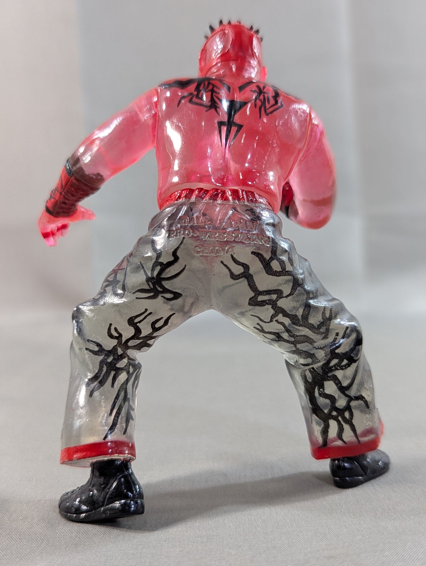 Great Muta (Red Clear, Finger Open)