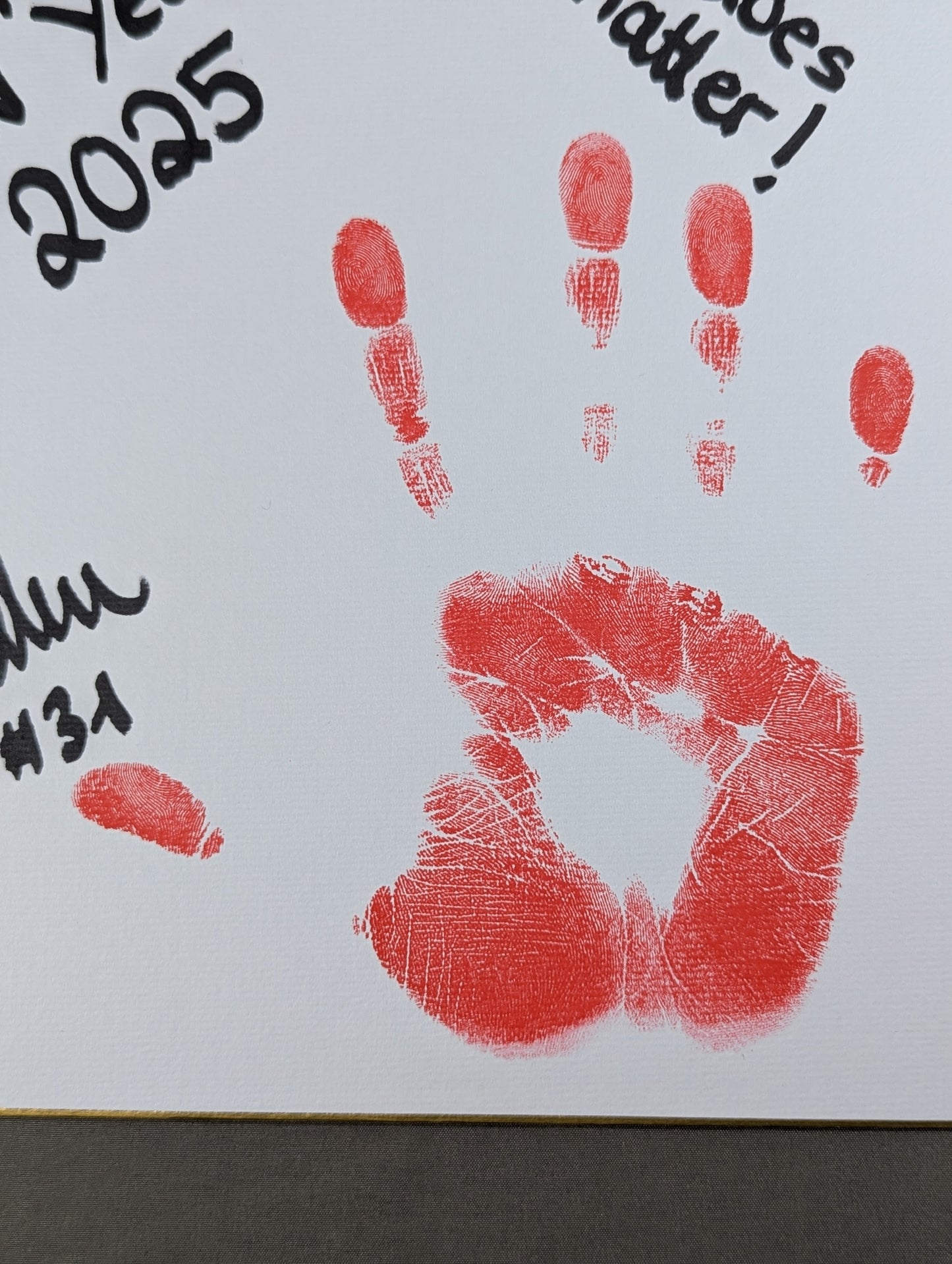 Podila (with handprint )