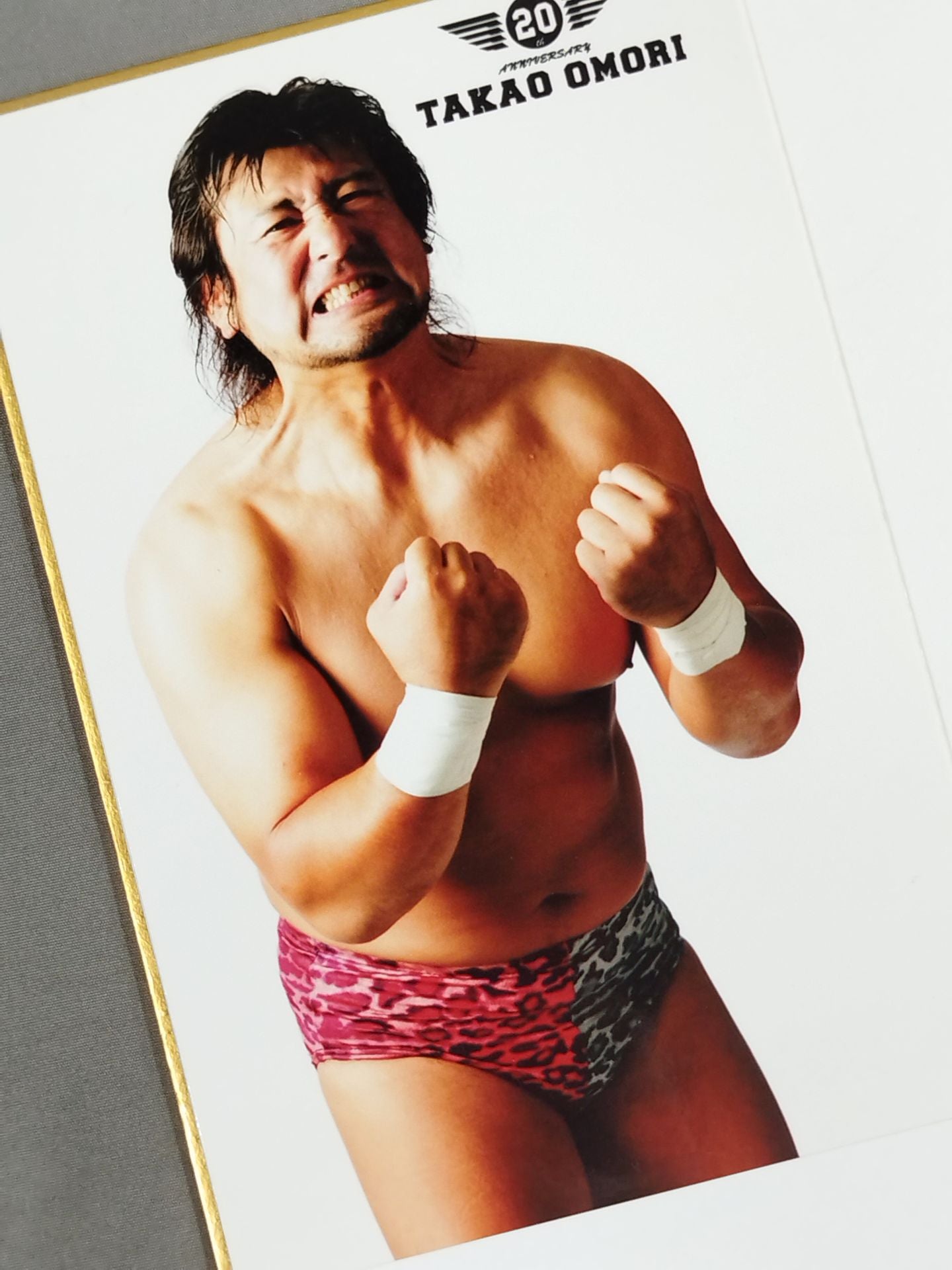 Takao Omori  (with photo )
