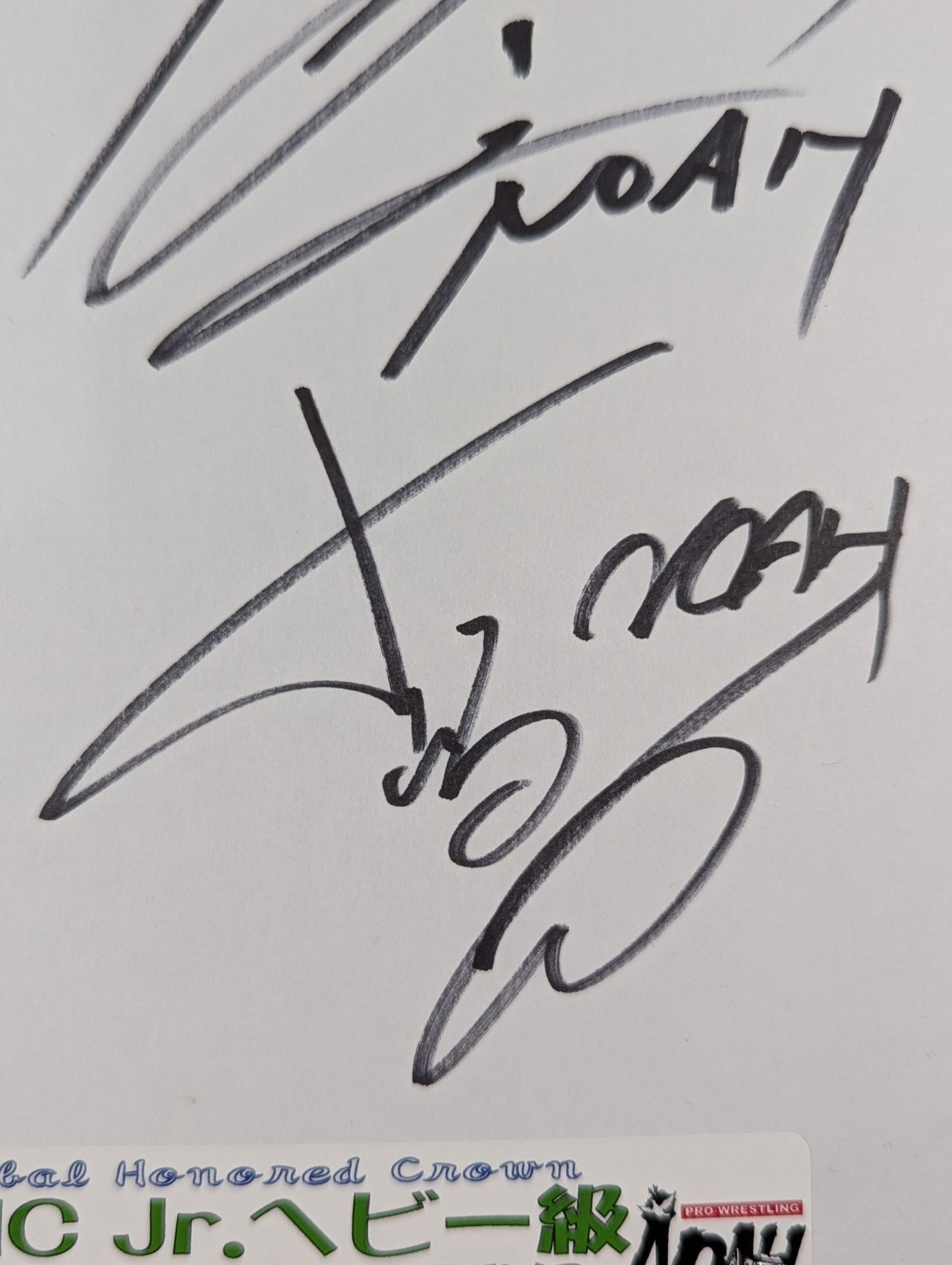 小川良成＆ザック・セイバーJr.vs石森太二＆小峠篤司(写真シール貼付)