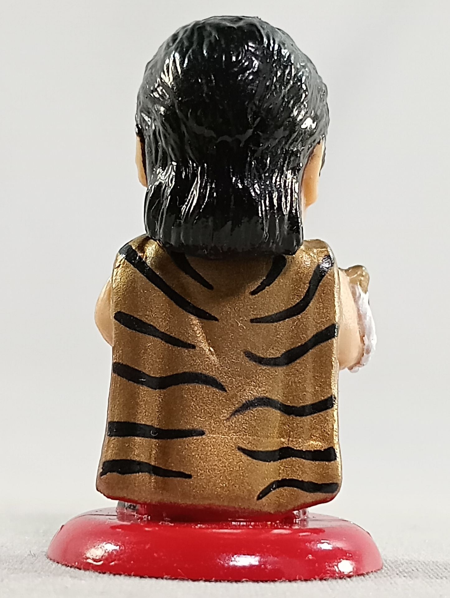 初代タイガーマスク(E)右手にマスク・素顔