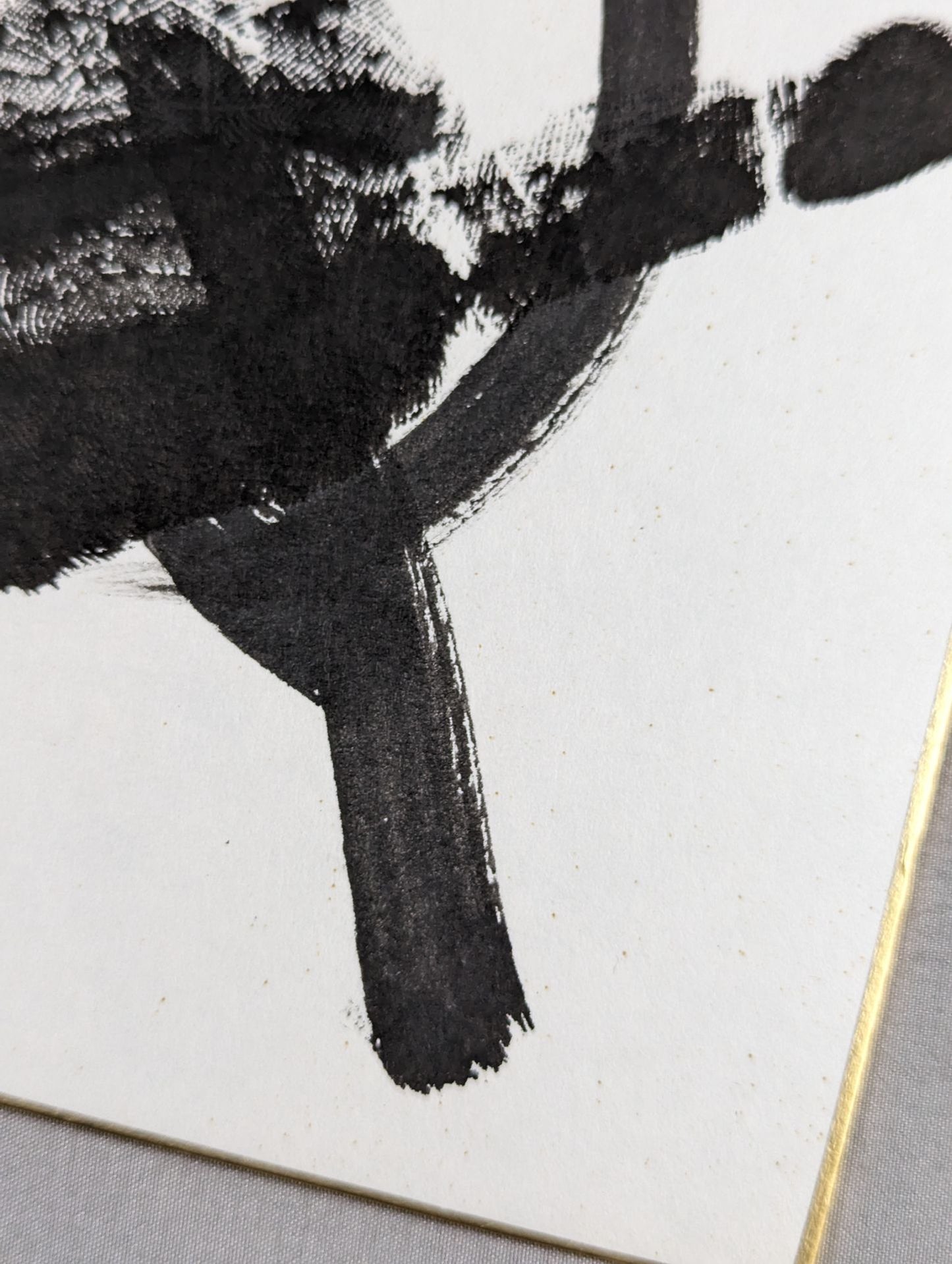 Kotobeppu (black with handprint)