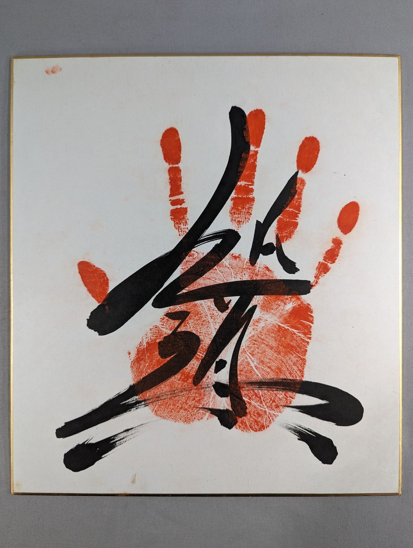 With handprint