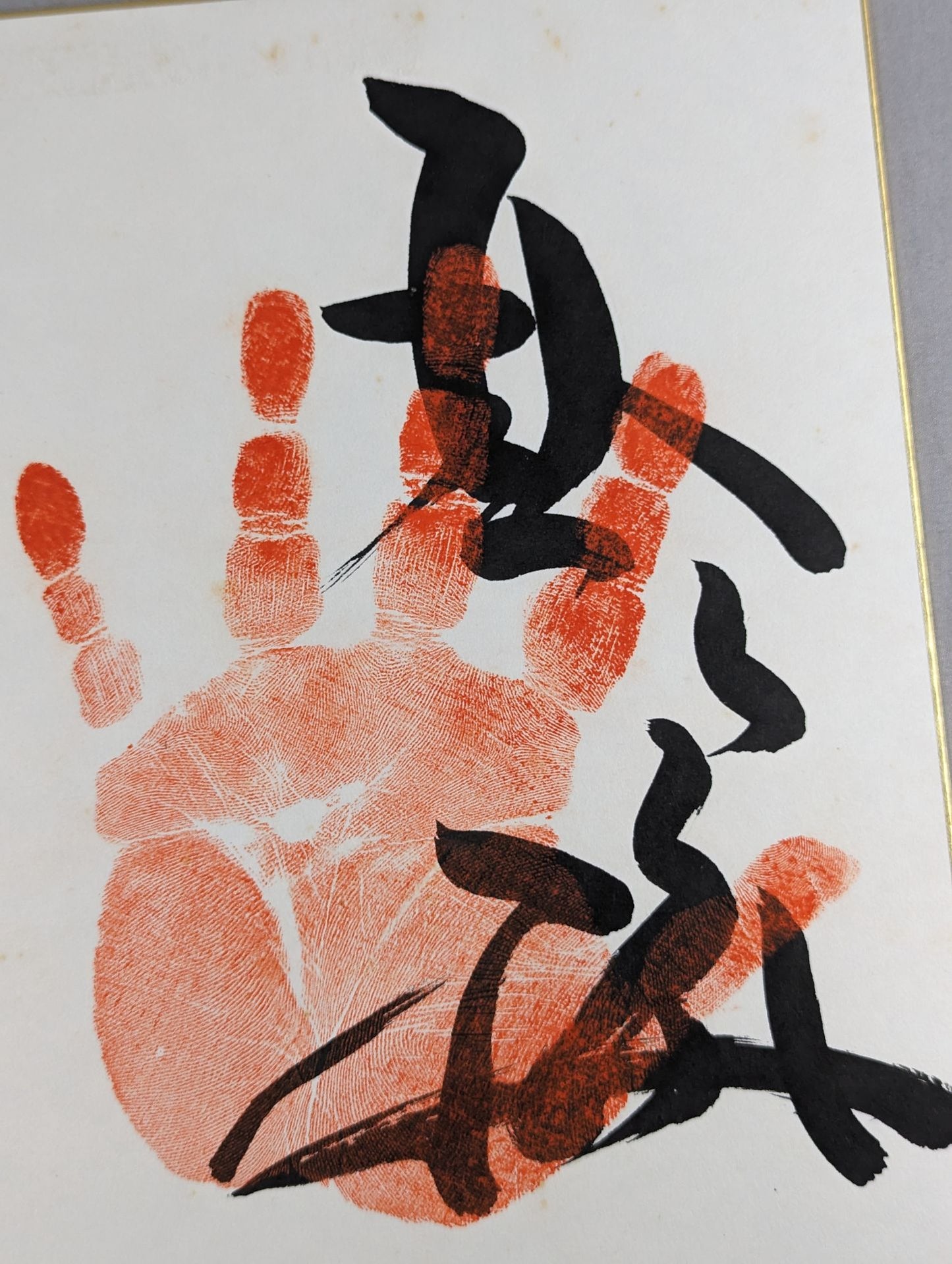 WITH handprint
