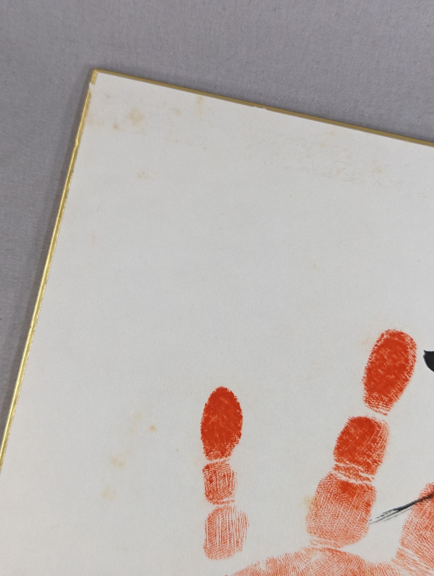 WITH handprint