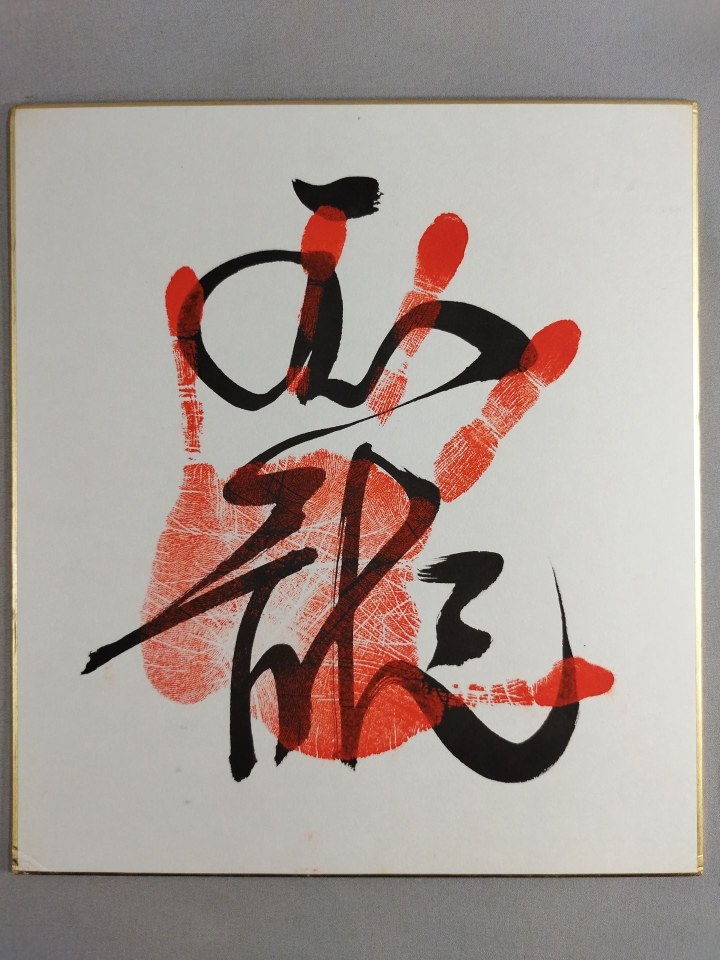 With handprint