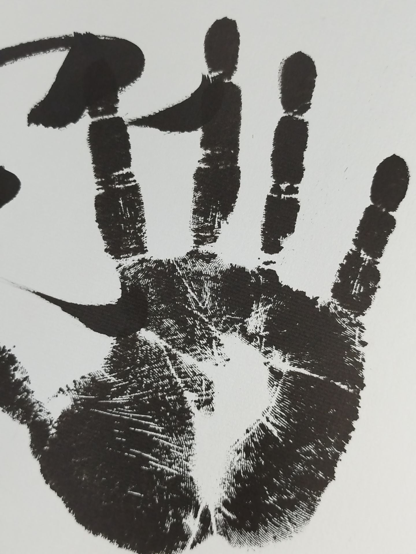 Tama Kasuga (black with handprint)