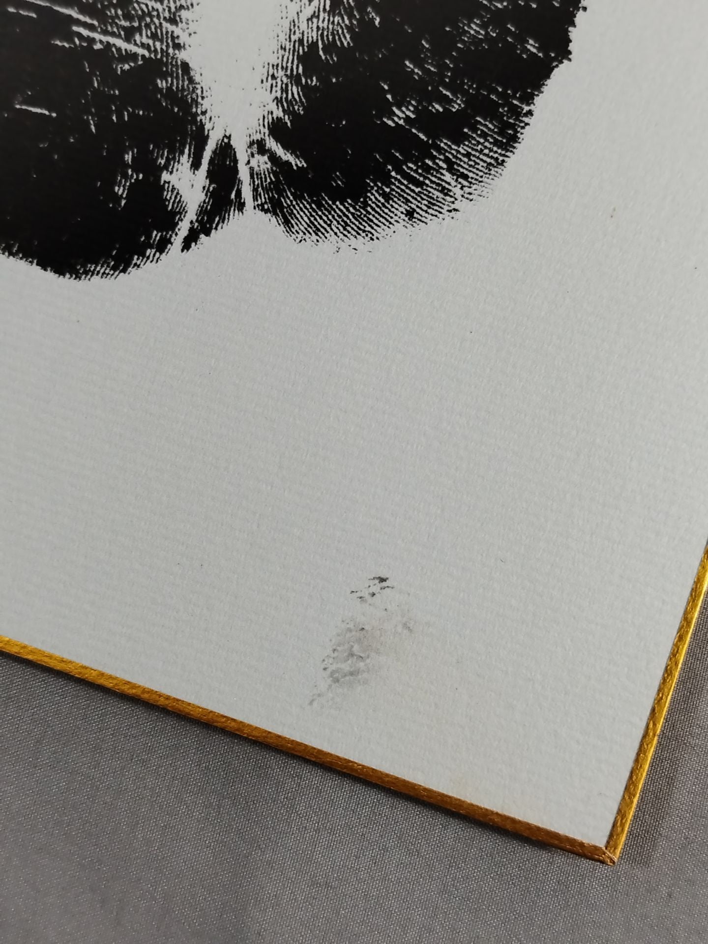 Tama Kasuga (black with handprint)