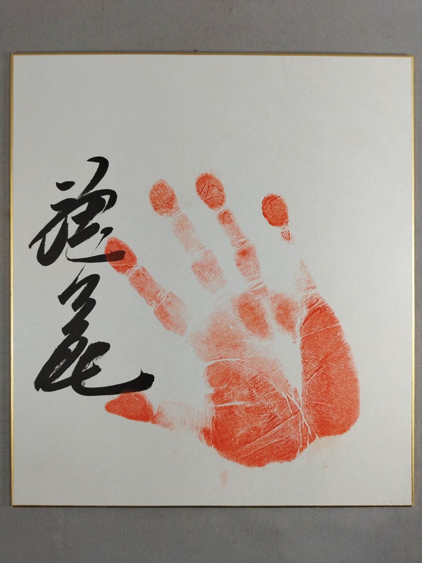 With handprint