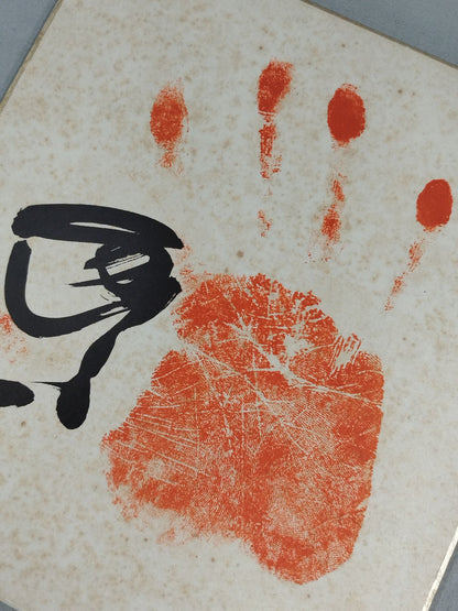 WITH handprint