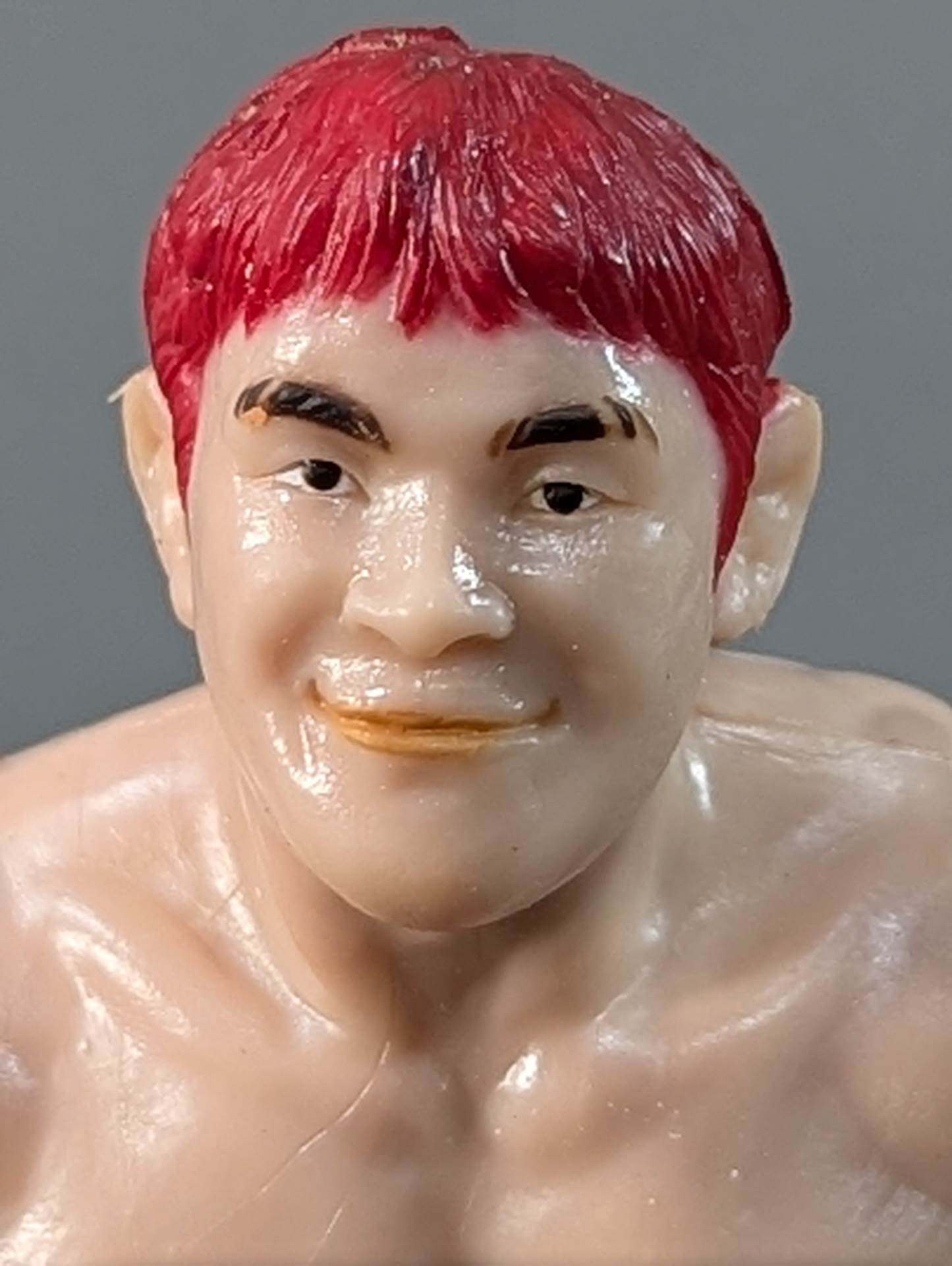 Kazushi Sakuraba (with red hair and SAKU machine)