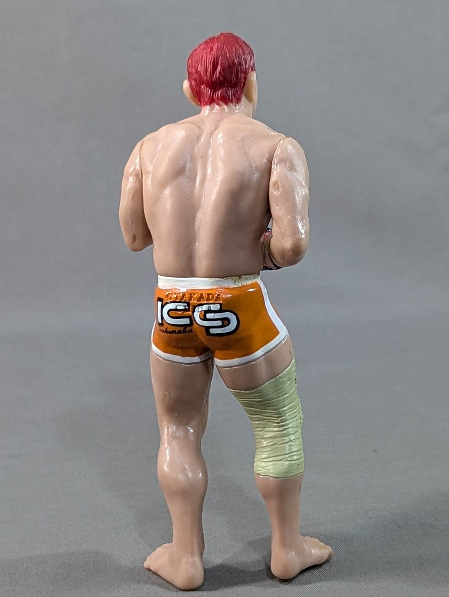 Kazushi Sakuraba (with red hair and SAKU machine)
