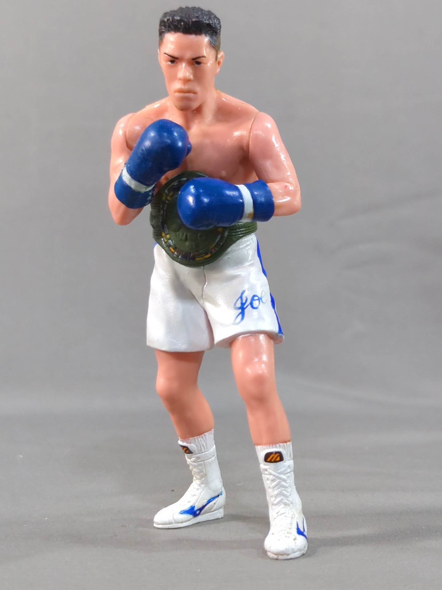 Joichiro Tatsuyoshi (beardless, blue glove)