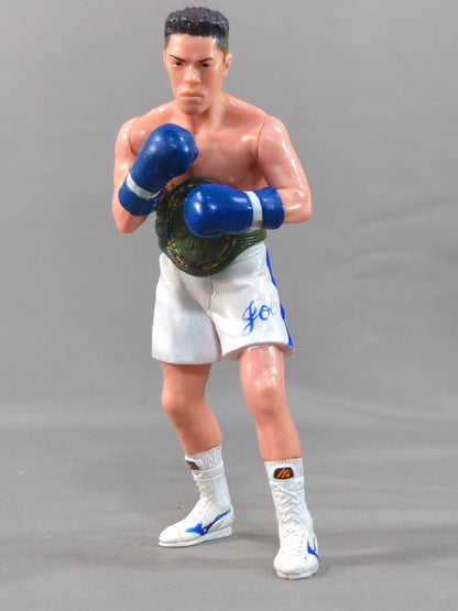 Joichiro Tatsuyoshi (beardless, blue glove)