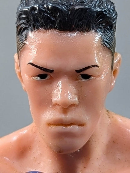Joichiro Tatsuyoshi (beardless, blue glove)