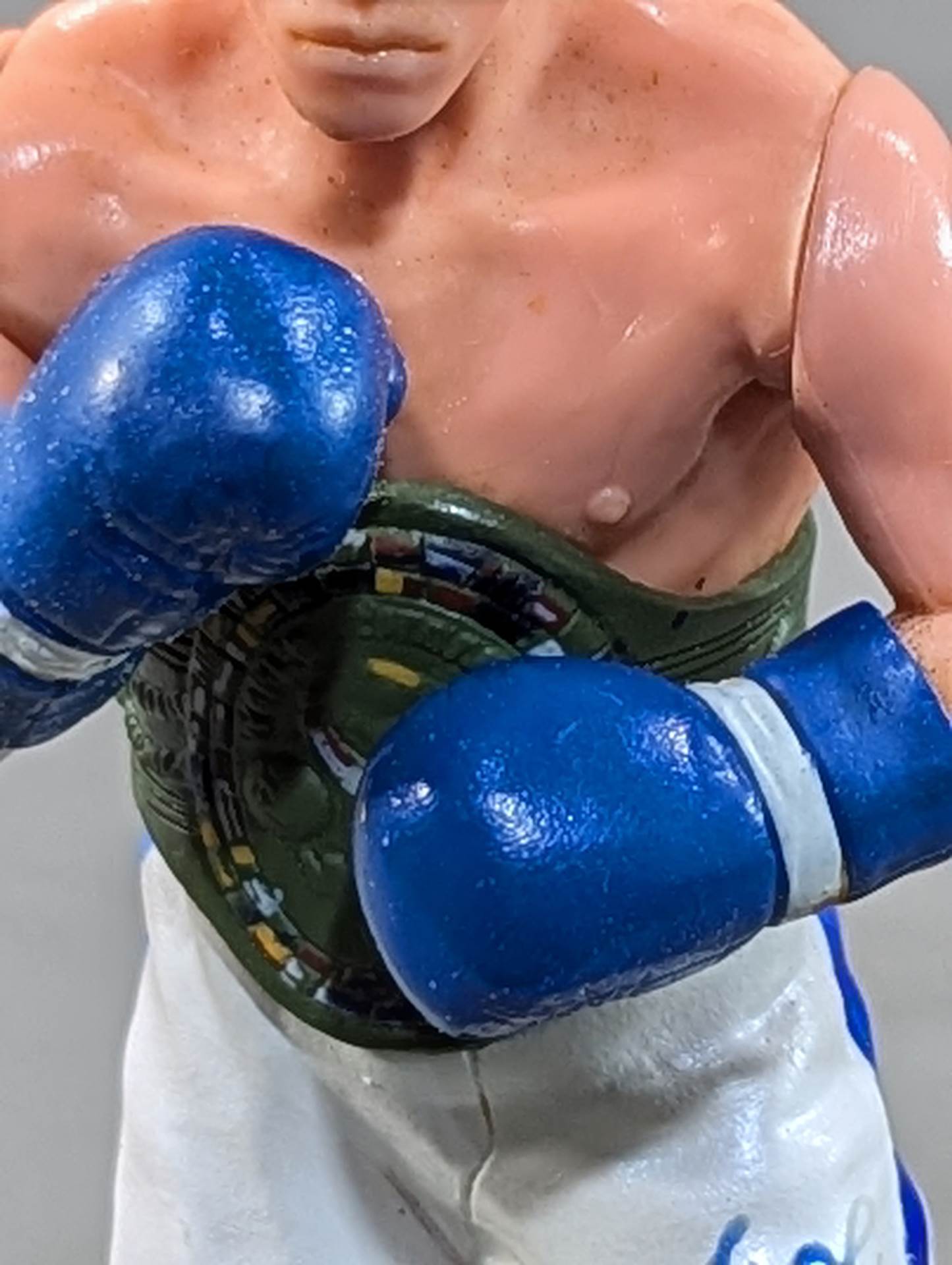 Joichiro Tatsuyoshi (beardless, blue glove)