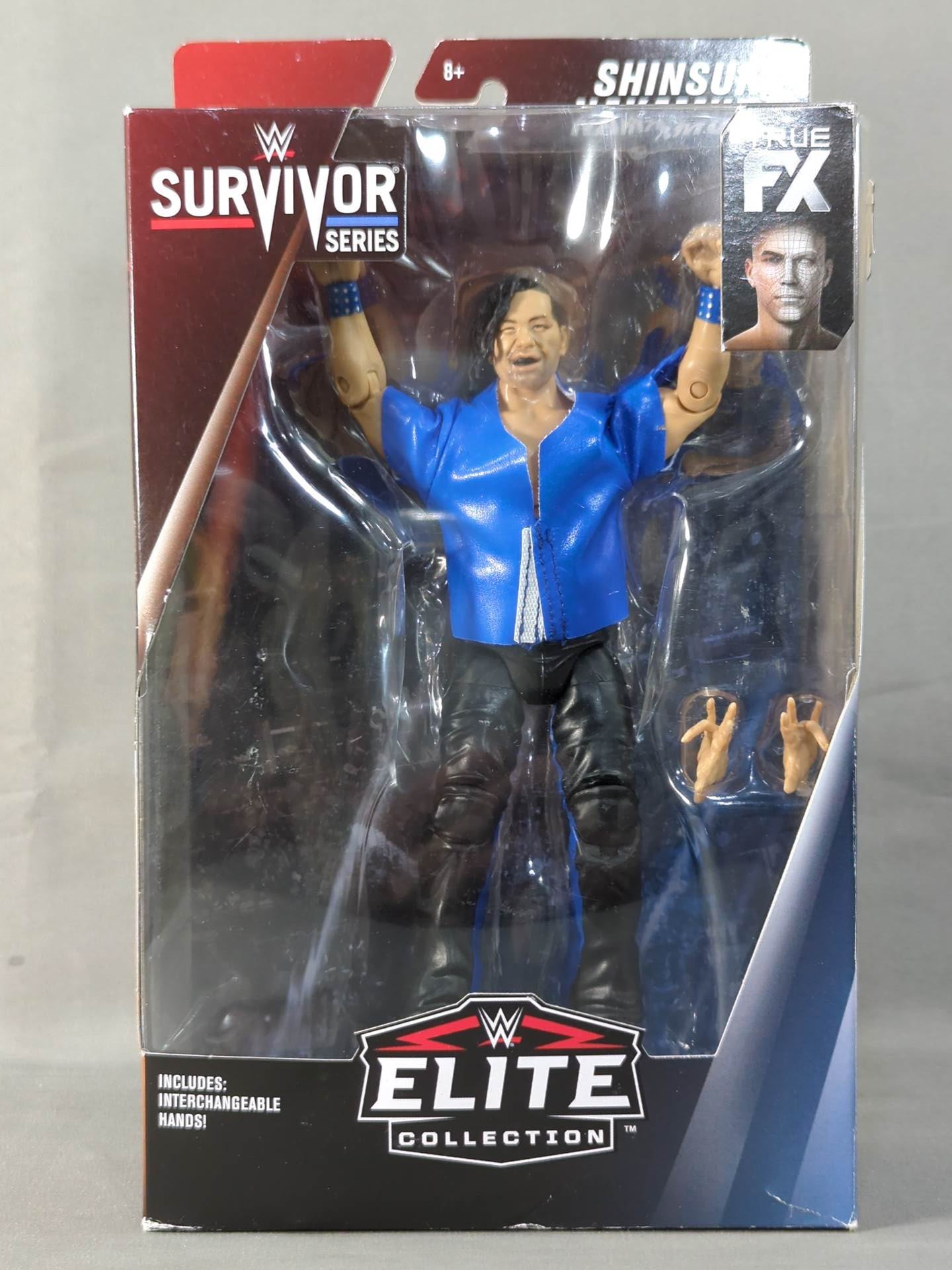 Shinsuke Nakamura  (blue shirt)