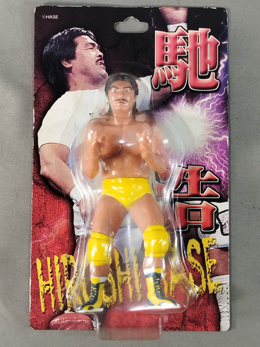 Hiroschi Hase  (yellow pants)