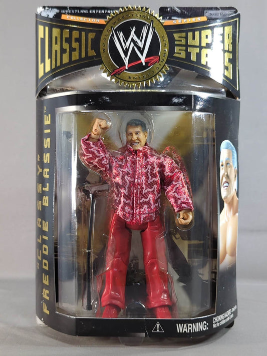Fred Blassie  (red jacket)