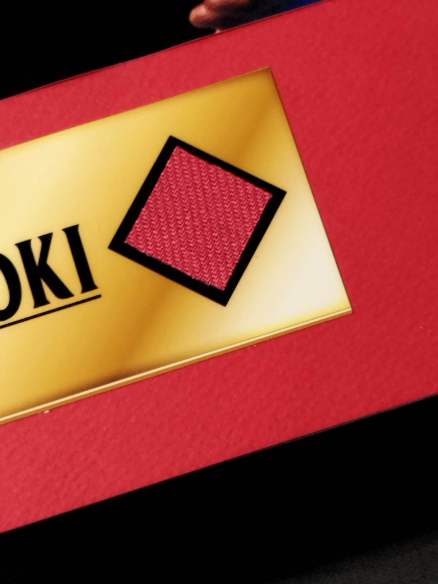Antonio Inoki  A piece of muffler towel enclosed Memorial panel (red)
