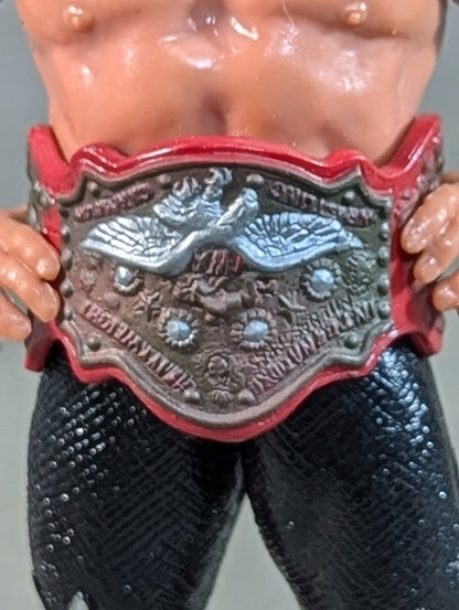 Mil Mascaras  (with silver trade and IWA belt)