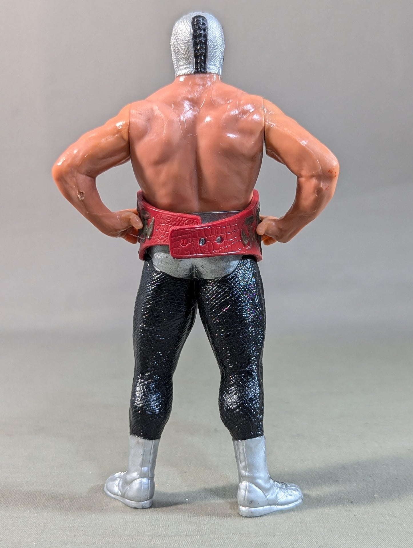Mil Mascaras  (with silver trade and IWA belt)