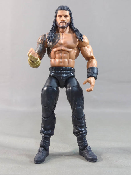 Roman Reigns  (black pants)