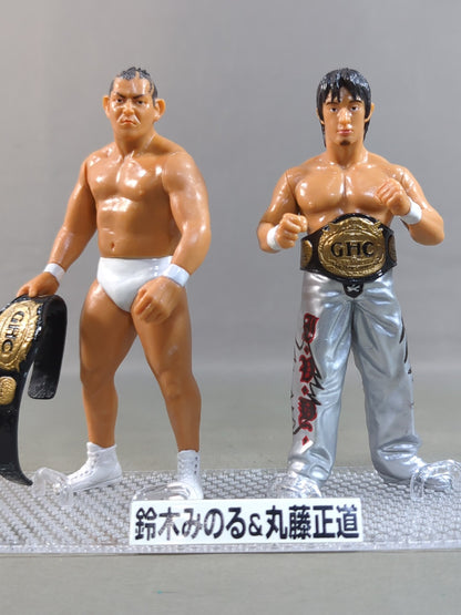 Minoru Suzuki (white) & Naomichi Marufuji  (silver)